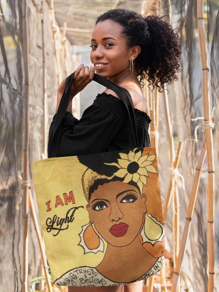 tote-bag-mockup-of-a-smiling-girl-with-a-kinky-hair-ponytail-26690
